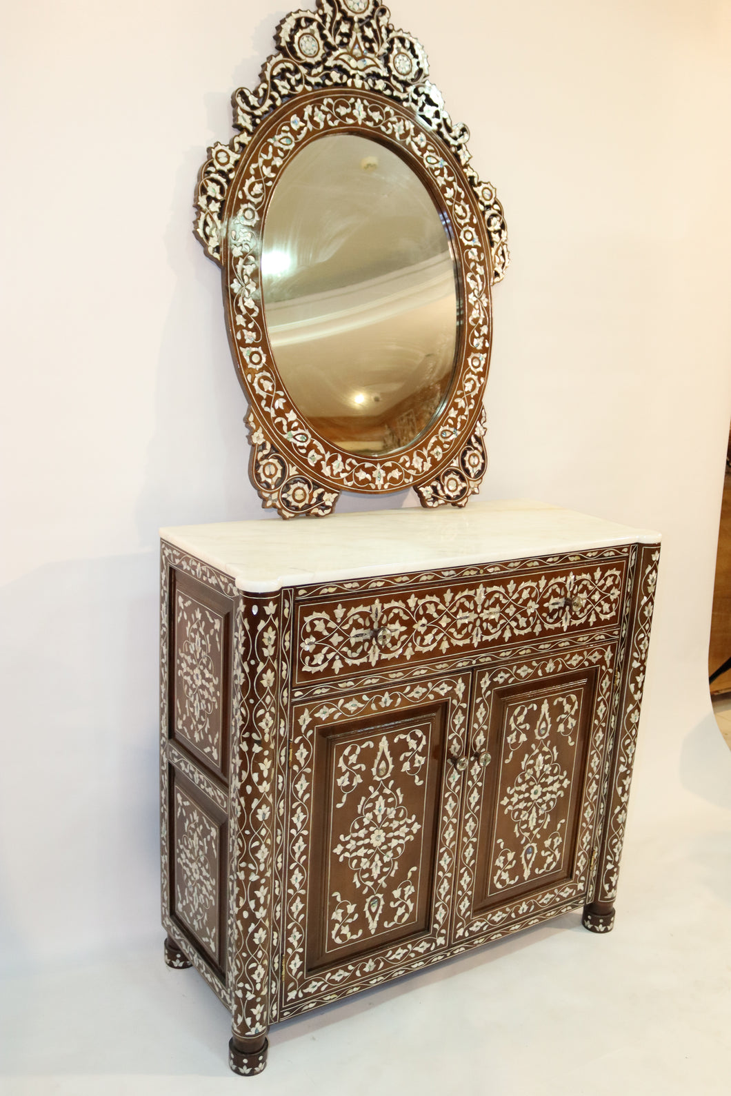 Mother of pearl inlay console and mirror .